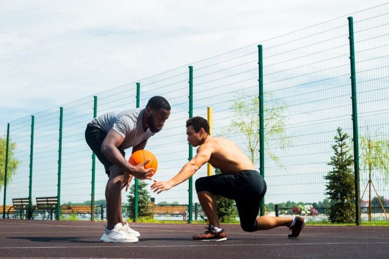 american-men-playing-urban-basketball-long-shot_23-2148264747