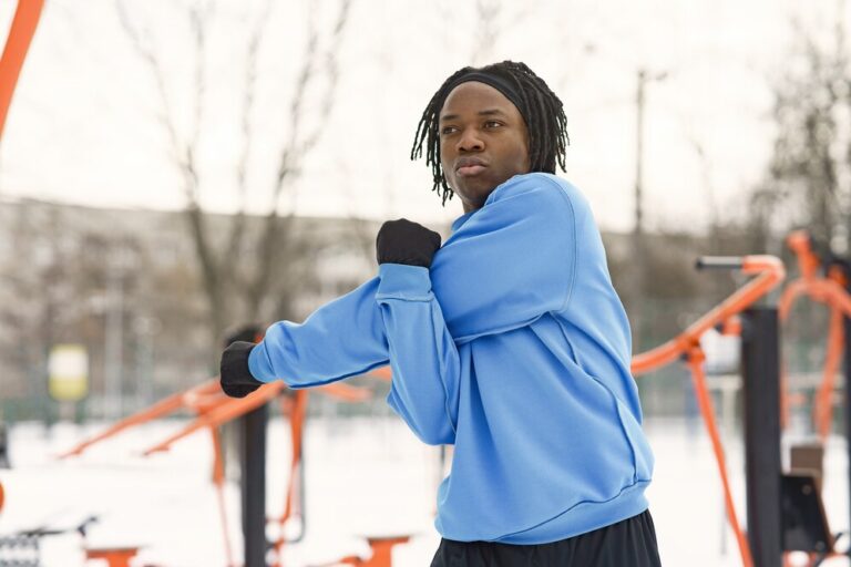 man-winter-park-african-guy-training-outside_1157-46400